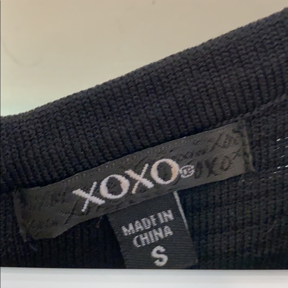 Black fitted dress with ruffle bottom - Picture 2 of 3